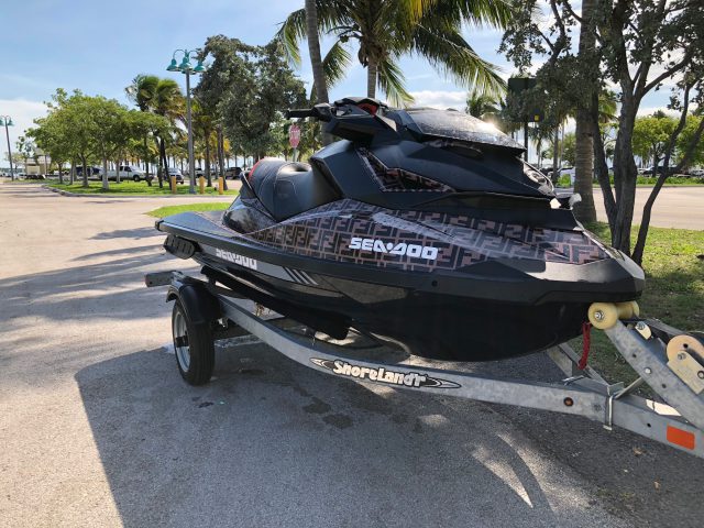 The custom Fendi wrap on the Sea-Doo RXP-X 300 watercraft connected the fully branded cover shot.